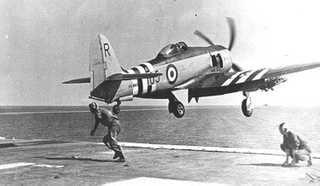 A Hawker Sea Fury launches from the British aircraft carrier HMS Glory (R62) during the Korean War in 1951